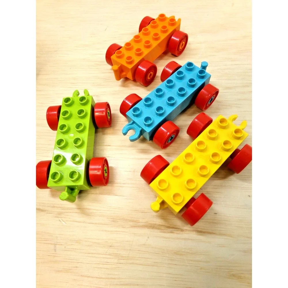 Large Legos Duplo Blocks 17 Pieces Wheels Car Chassis Boats and Airplanes